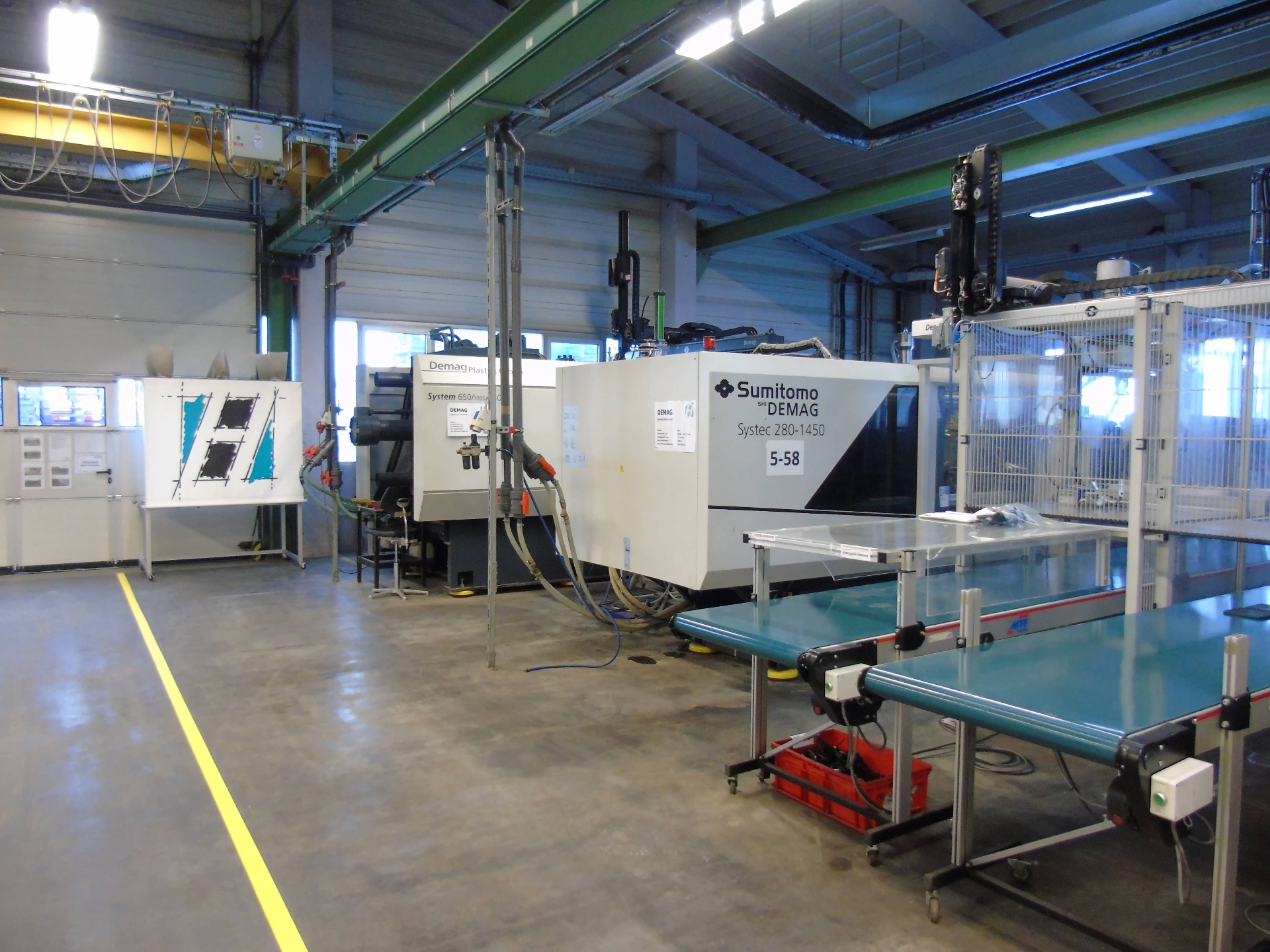 Sumitomo Demag Systec 280-1450 mit Handling
